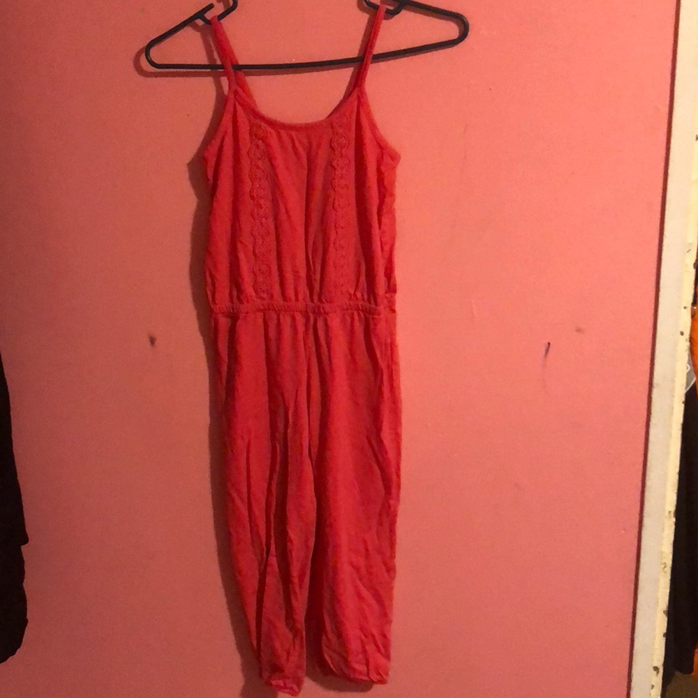 A spaghetti strap with pans romper
